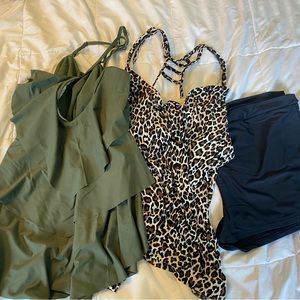 2 swim tops and 1 pair of swim shorts